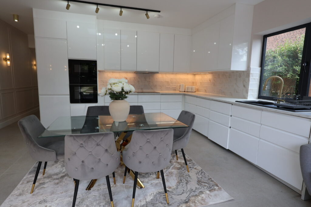 Fully equipped kitchen with modern appliances and cookware in a Namis Suites serviced apartment Farnborough.